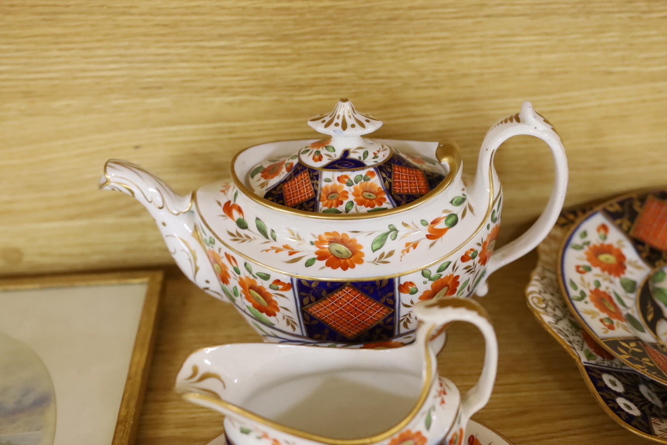 A 19th century English porcelain part tea and coffee set, probably Coalport and a similar Wedgwood part set